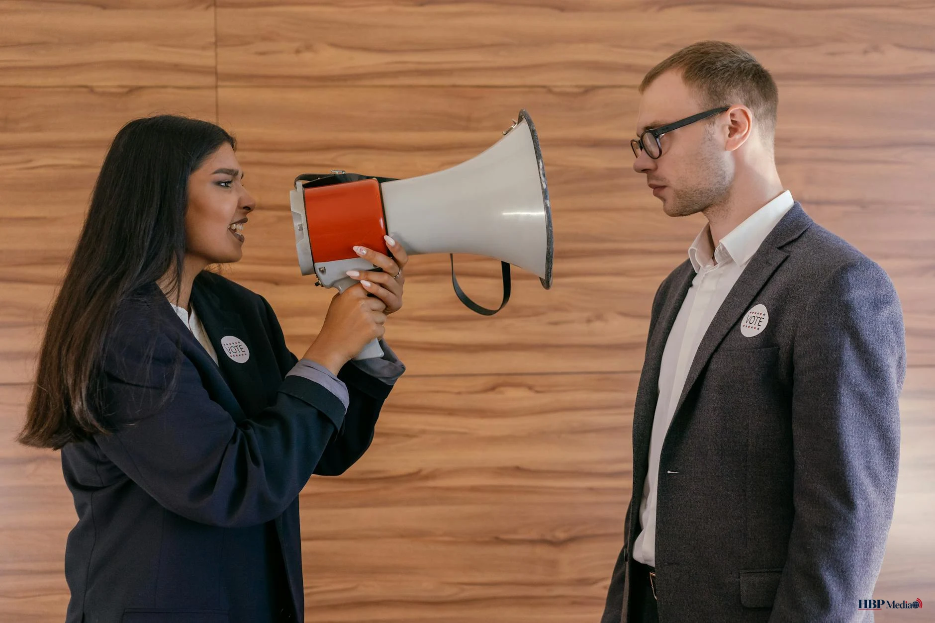 politician holding loudspeaker
