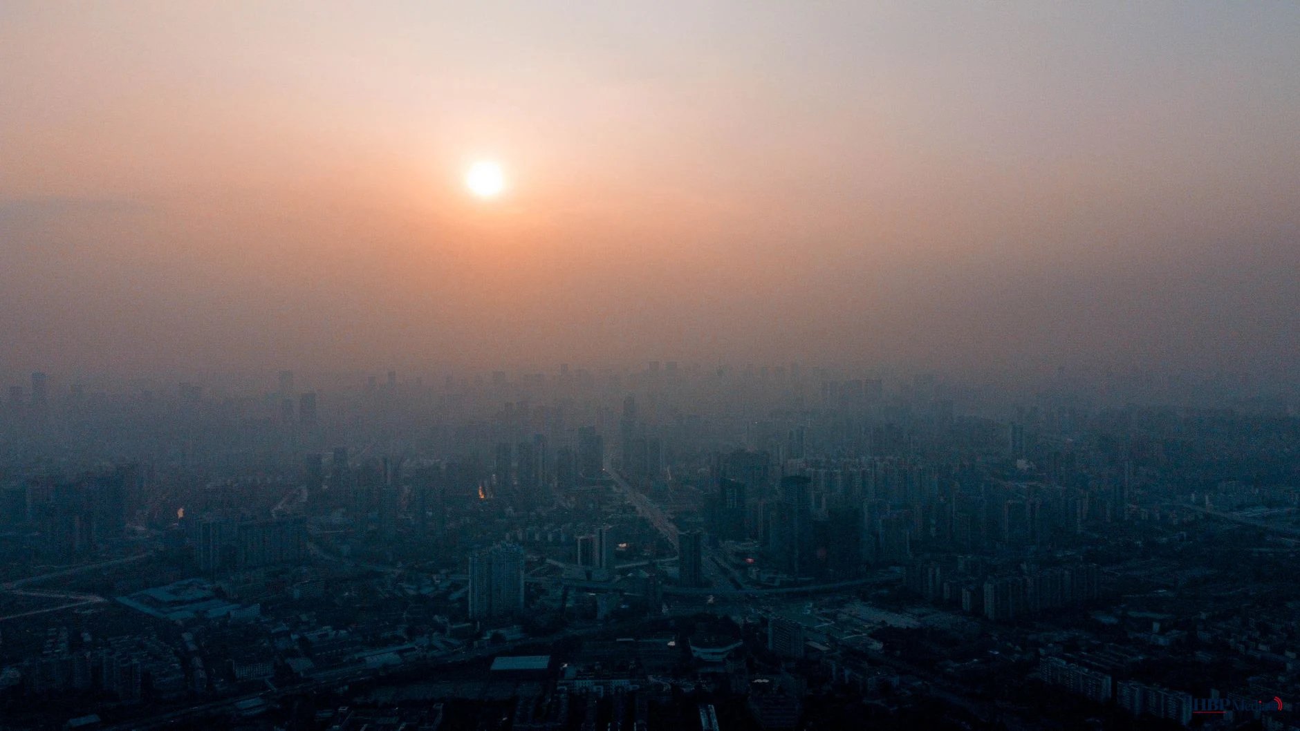 aerial view of a city during sunset