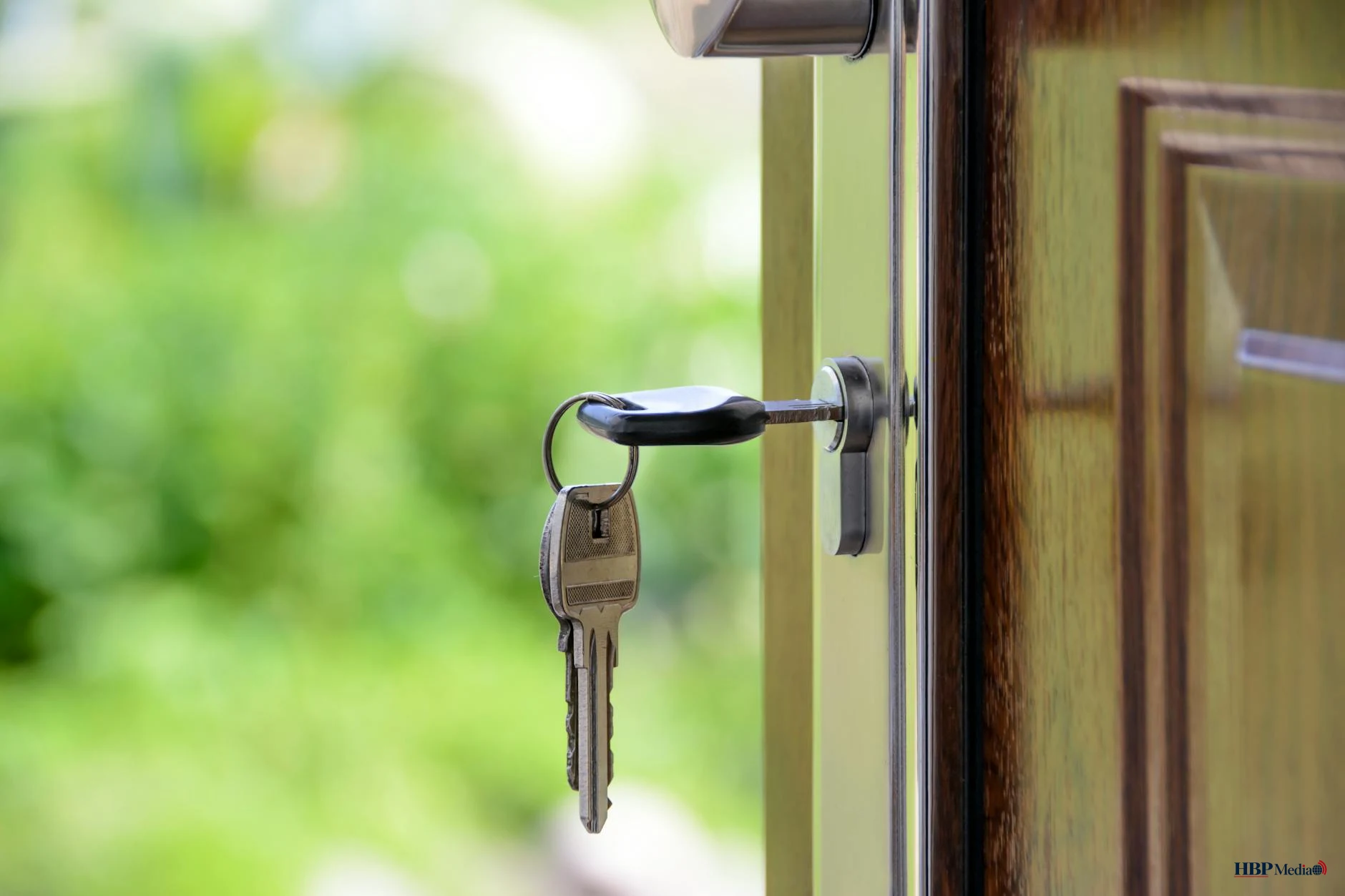 black handled key on key hole