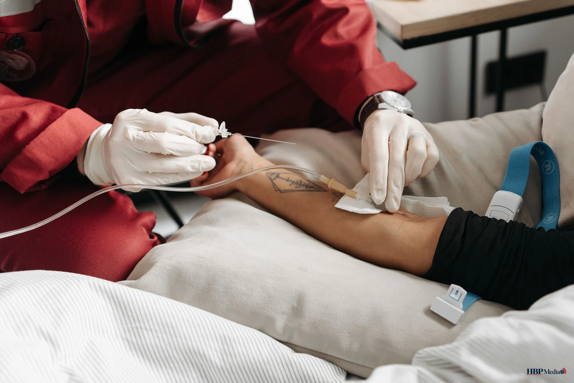 emt holding a needle