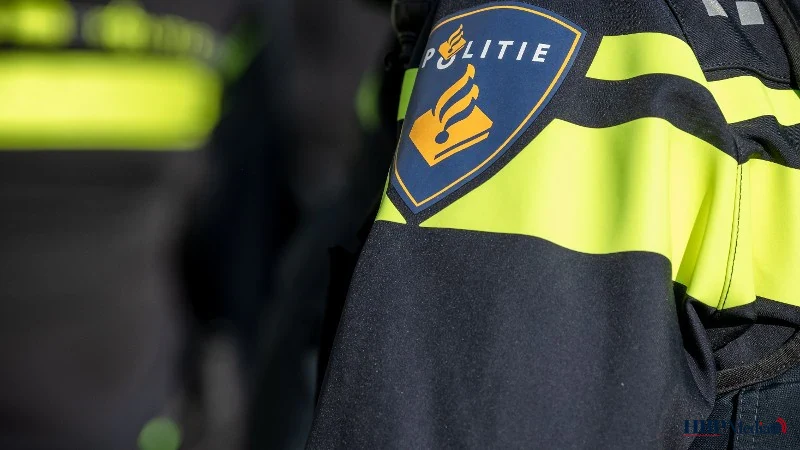 Politieauto met zwaailichten na tragisch verkeersongeval Bezuidenhoutseweg Den Haag.