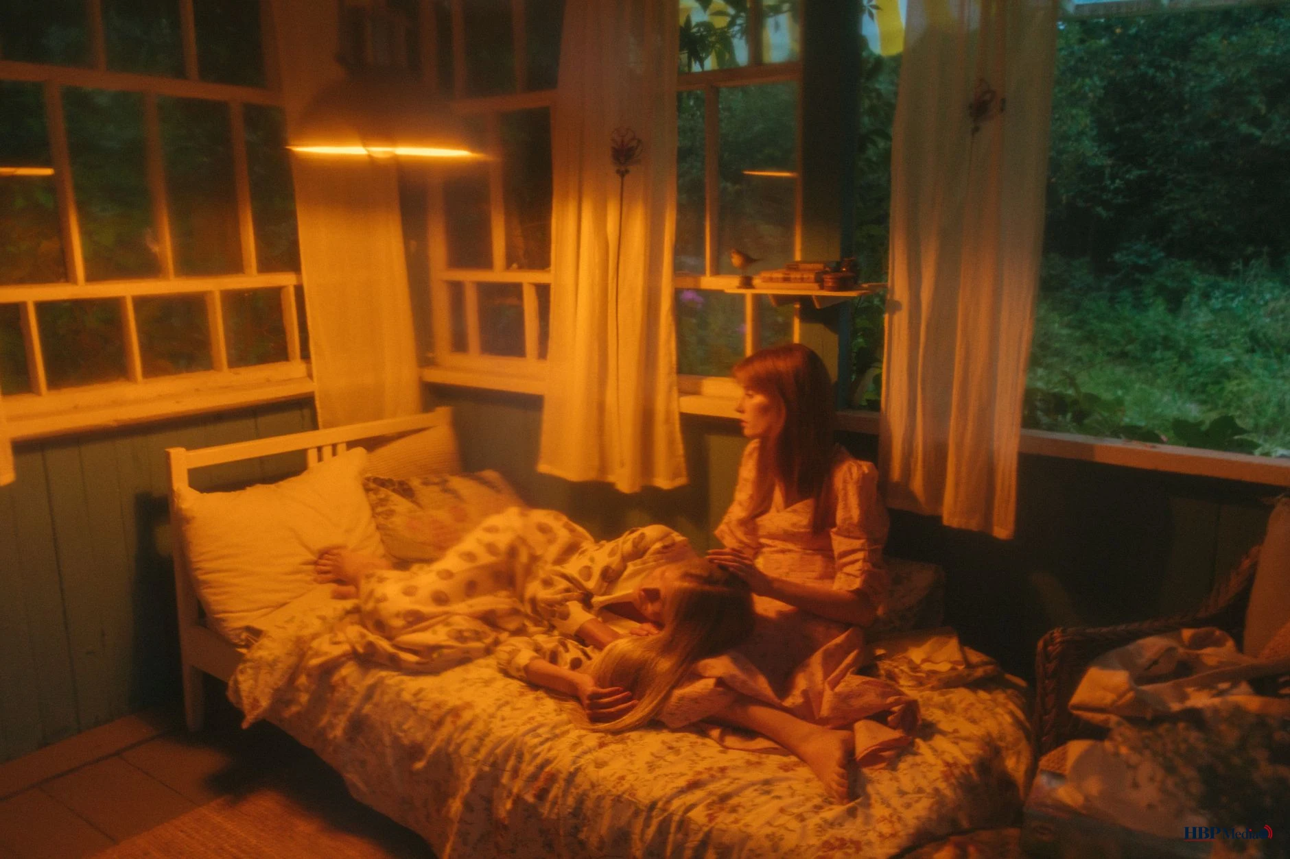two women in bed