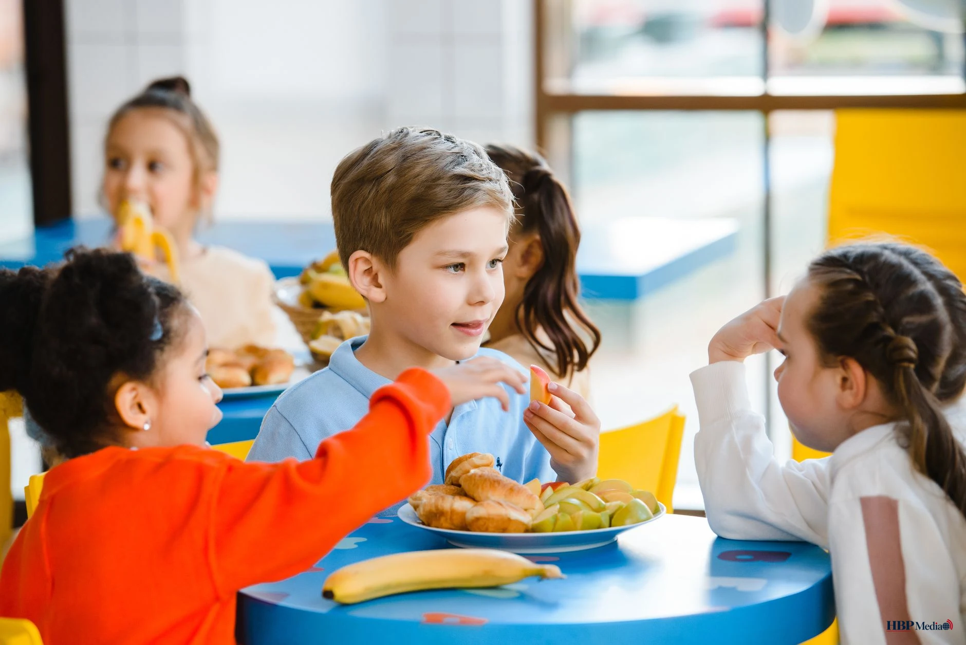 children eating together