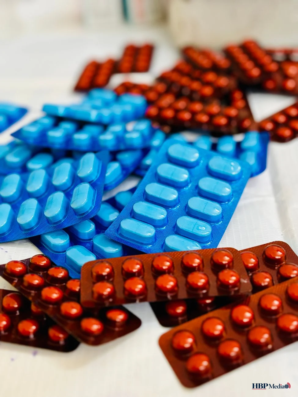 colorful assortment of pills and blisters
