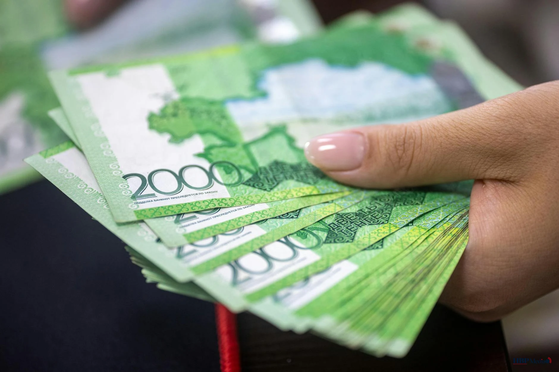 hand holding russian ruble banknotes close up