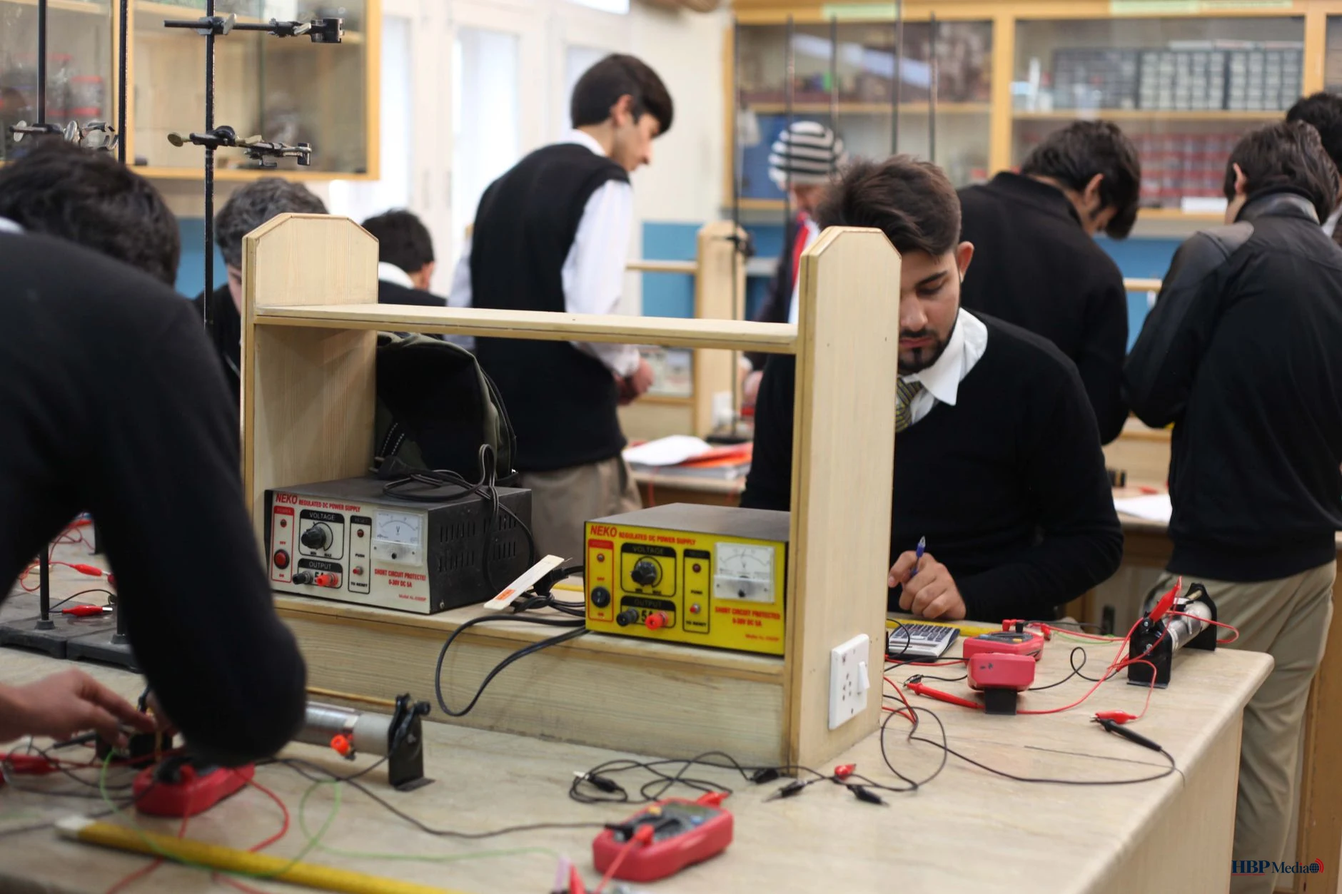 students engaged in electronics lab activity