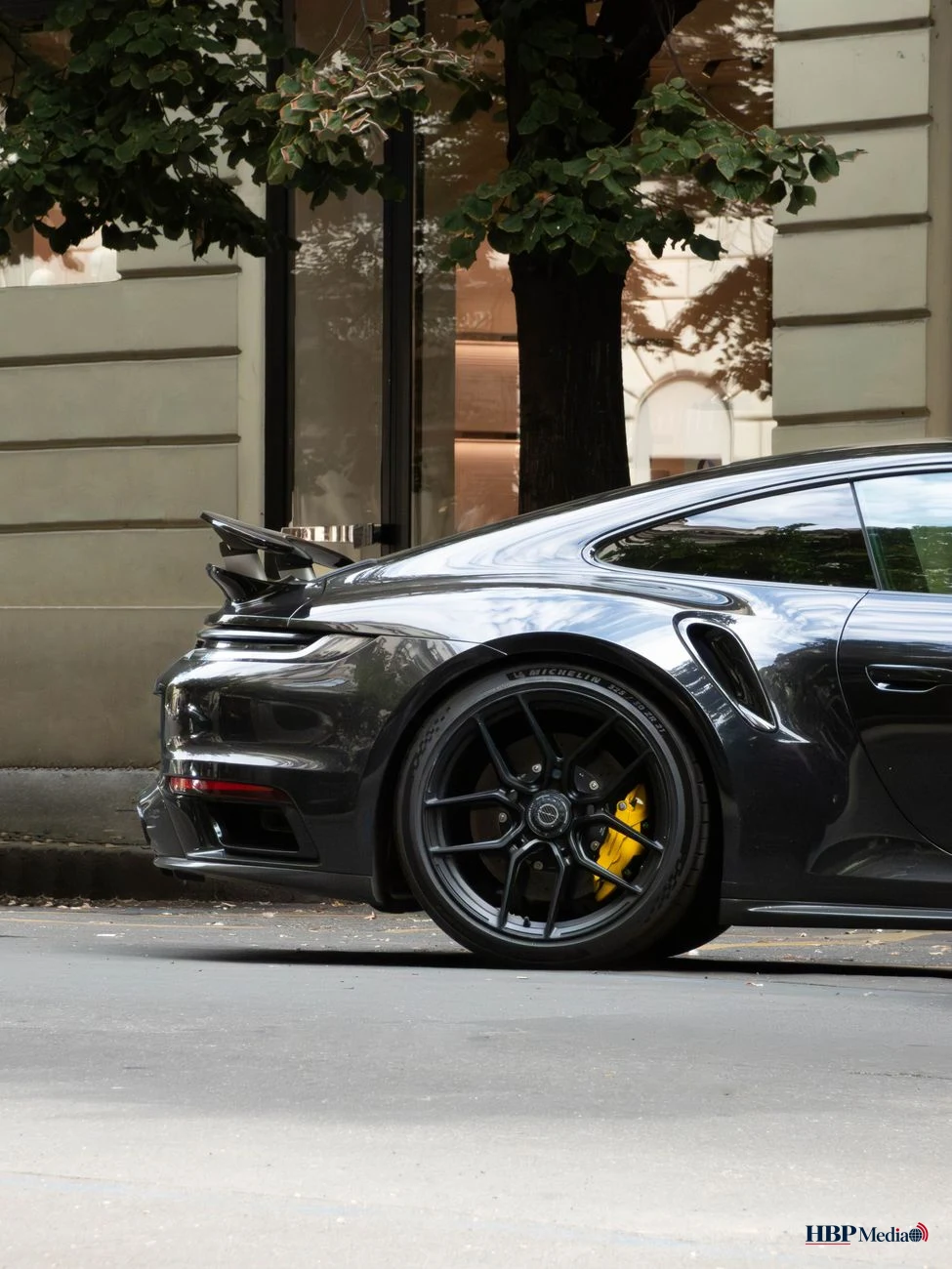 sleek modern sports car parked in urban street