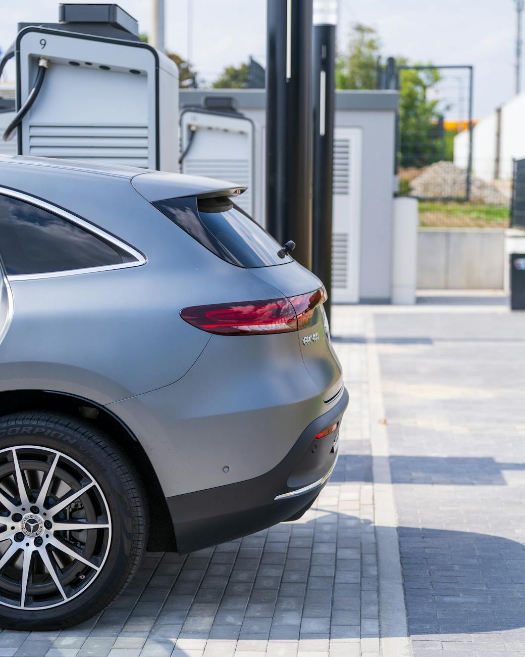 electric vehicle charging at modern station
