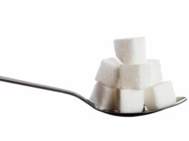 cubes of sugar on spoon